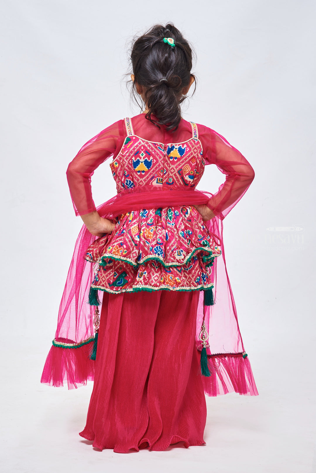 The Nesavu Girls Sharara / Plazo Set Stunning Sequins Embroidered Patola Designer Pink Peplum Kurti with Palazzo: Traditional Grace for Girls. Nesavu Patola Designer Pink Kurti with Palazzo set | Girls Festive Collecetions | The Nesavu