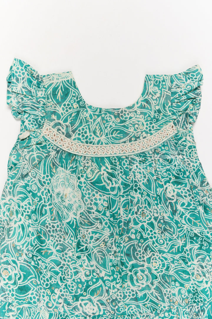 The Nesavu Girls Cotton Frock Stylish Girls Cotton One Piece Dress with Floral Print and Ruffle Hemline Nesavu Nesavu Girls Cotton One Piece Dress Floral Print Ruffles Lace Detailing Summer Style