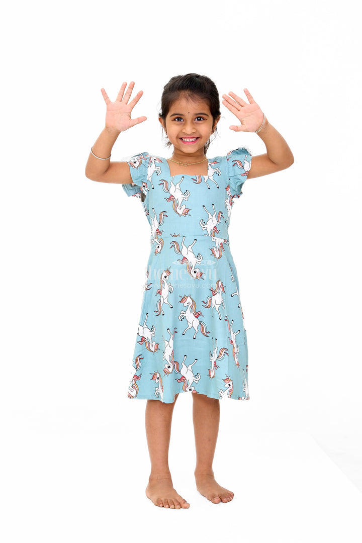 The Nesavu Girls Cotton Frock Stylish Girls Cotton Straight Dress with Unicorn Print and Ruffled Sleeves Nesavu Nesavu Girls Cotton Straight Dress Unicorn Print Ruffled Sleeves Teal Finish