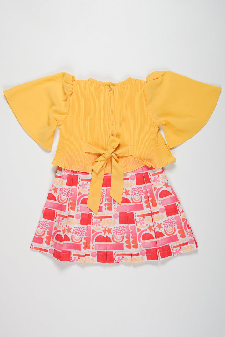 The Nesavu Girls Fancy Frock Stylish Playtime Cotton Frock for Girls - Bright Yellow and Pink Nesavu Discover Elegant New Cotton Frocks for Girls | Soft and Fancy Designs Available | The Nesavu