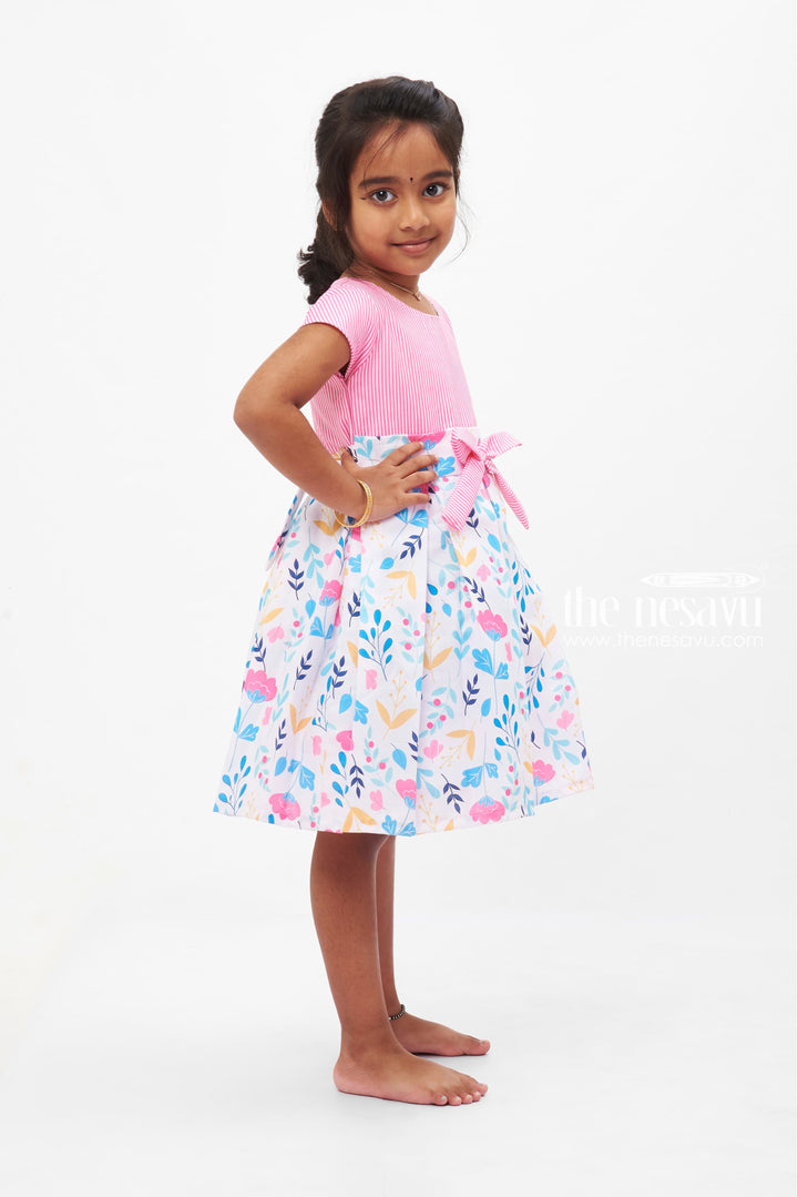 The Nesavu Girls Fancy Frock Summer Breeze Floral Cotton Frock: Pastel Blossom Print with Striped Accents for Girls Nesavu Girls' Pastel Floral Cotton Dress | Striped and Floral Frock | The Nesavu