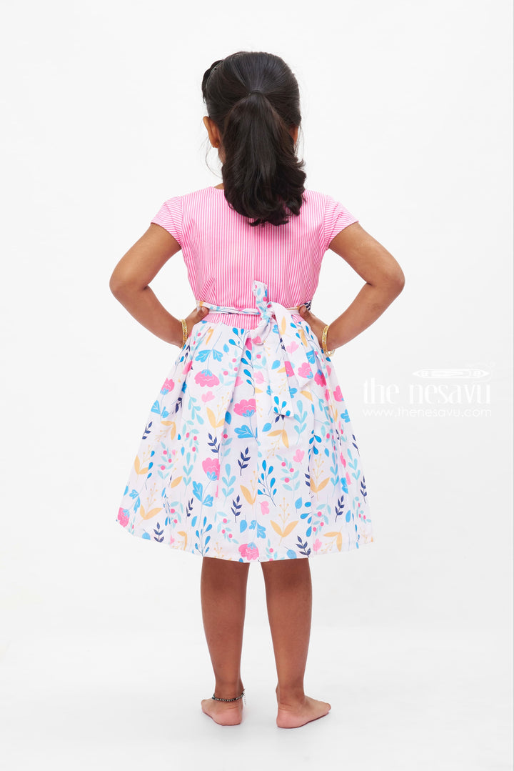 The Nesavu Girls Fancy Frock Summer Breeze Floral Cotton Frock: Pastel Blossom Print with Striped Accents for Girls Nesavu Girls' Pastel Floral Cotton Dress | Striped and Floral Frock | The Nesavu