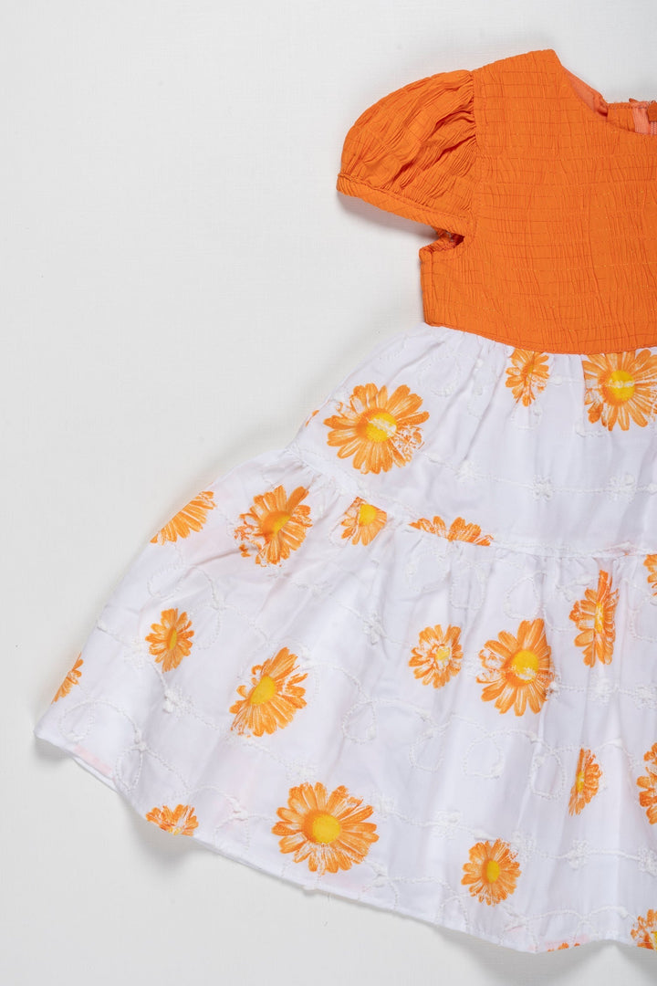 The Nesavu Girls Cotton Frock Sunkissed Delight Orange Cotton Frock with Floral Print for Girls Nesavu Girls Orange Floral Pure Cotton Summer Frock | Comfortable & Stylish | The Nesavu