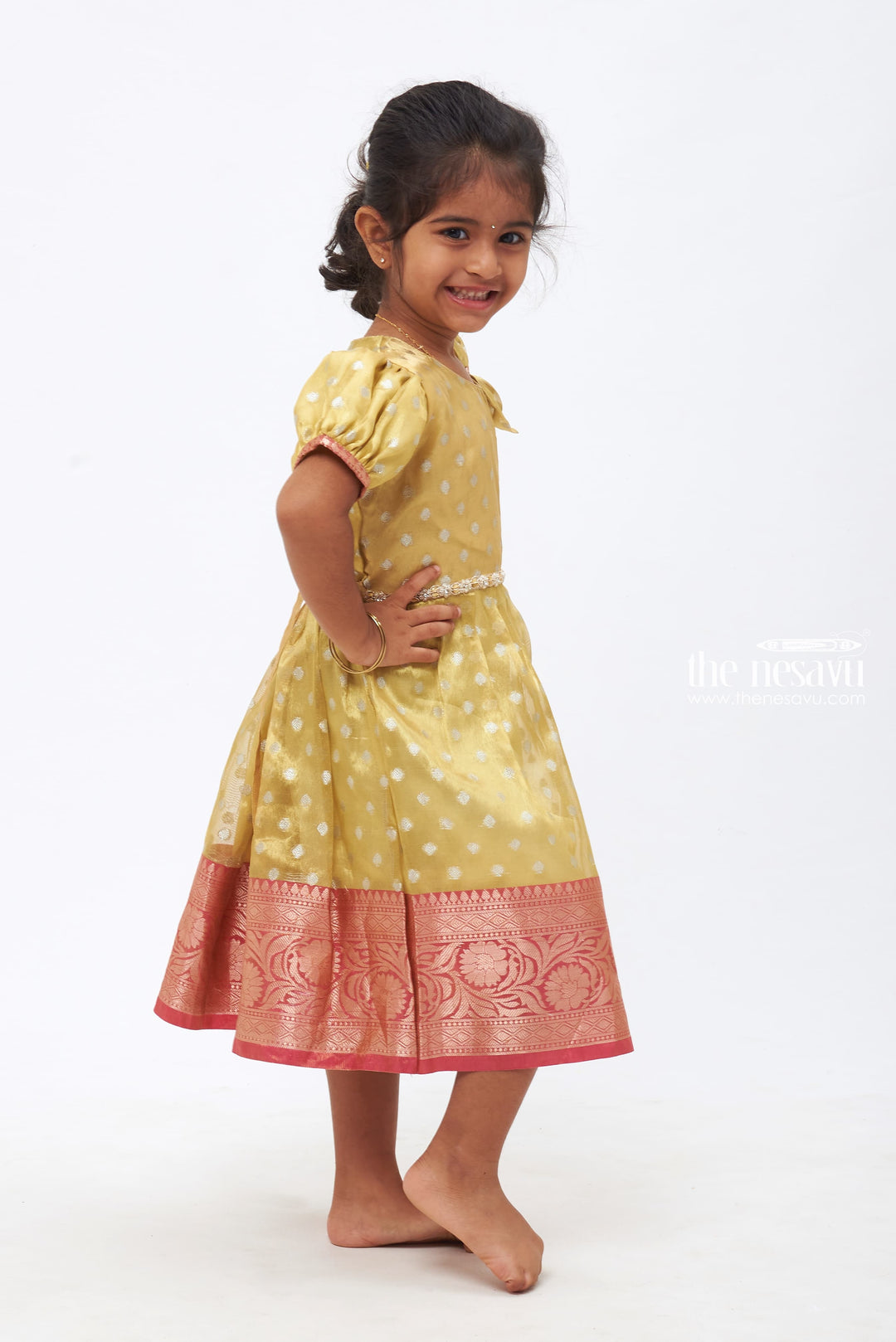 The Nesavu Silk Frock Sunlit Elegance: Yellow Silk Frock with Banarasi Designer Sparkling Stone Detail Nesavu Sunlit Elegance Yellow Silk Frock | Traditional Kids' Wear with Sparkling Stone Detail | The Nesavu