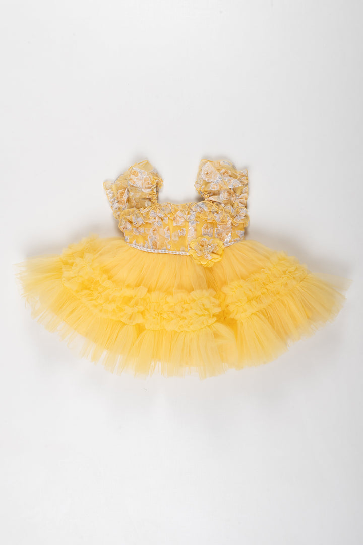 The Nesavu Girls Tutu Frock Sunny Delight Floral Party Frock: Radiance in Ruffles for the Little Charmer Nesavu 16 (1Y) / Yellow / Plain Net PF185B-16 Buy Toddlers Yellow Floral Boutique Party Dress | Girls Fancy Short Frock Online | The Nesavu