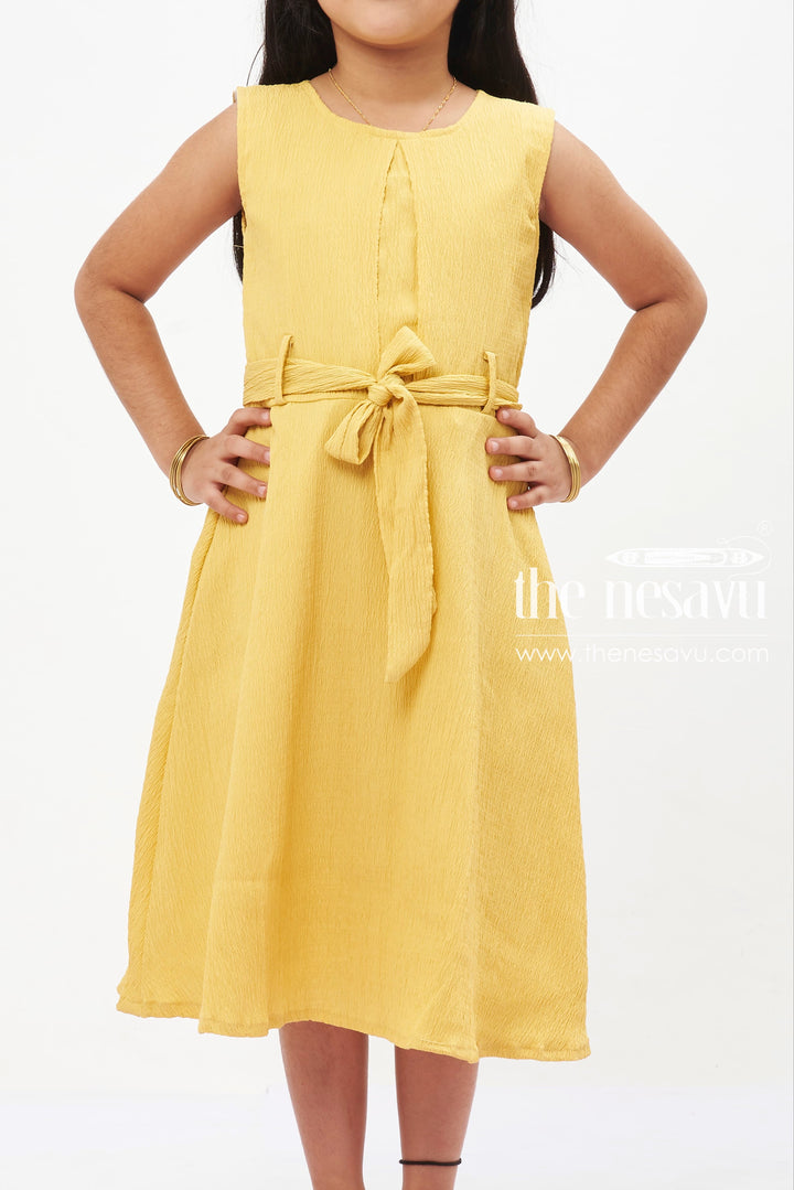 The Nesavu Girls Fancy Frock Sunny Yellow Bow Detail Cotton Dress: Bright and Beautiful for Girls Nesavu Girls' Vibrant Yellow Cotton Dress | Sleeveless Bow Frock | The Nesavu