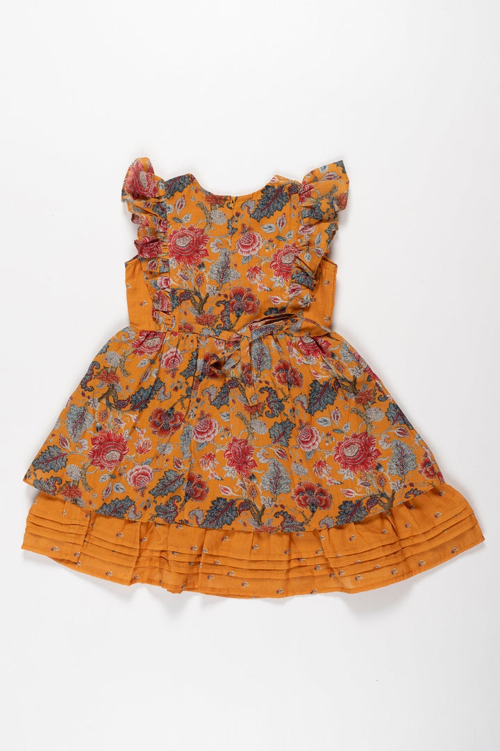 The Nesavu Girls Cotton Frock Sunshine and Blooms: Girls Mustard Floral Cotton Frock with Ruffle Accents Nesavu Shop Mustard Floral Ruffle Girls Cotton Frock | Ideal Summer Wear | The Nesavu