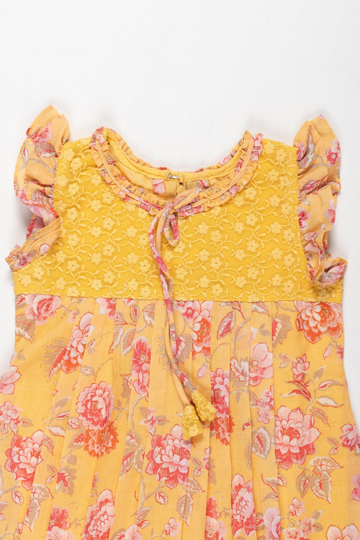 The Nesavu Girls Cotton Frock Sunshine and Blossoms: Girls Yellow Lace-Accentuated Floral Dress Nesavu Get the Latest Girls' Yellow Floral Cotton Dress | Perfect for Spring | The Nesavu