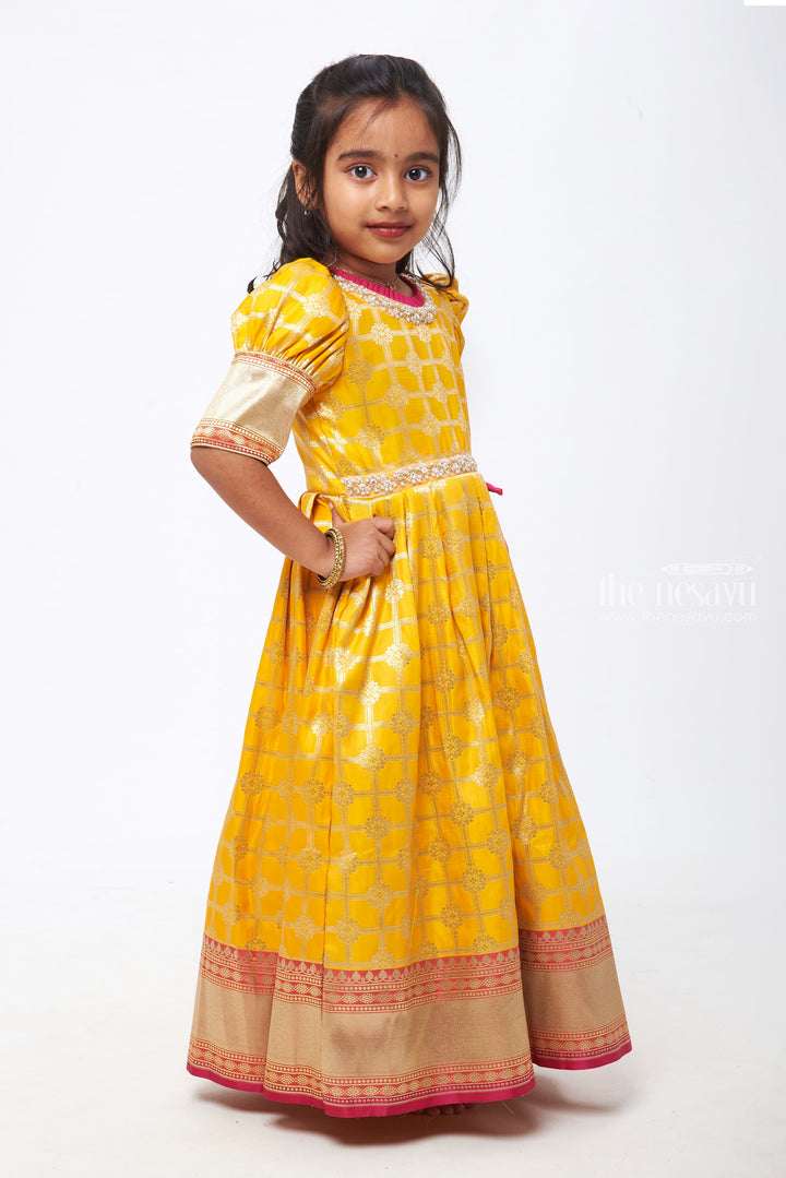 The Nesavu Silk Gown Sunshine Charm: Yellow & Pink Zari Checkered Floral Pleated Jacquard Silk Gown for Girls Nesavu Festive Diwali Anarkali Outfits | Exclusive Anarkali Dress | The Nesavu