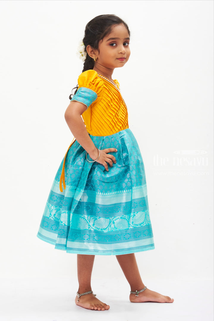 The Nesavu Silk Frock Sunshine Yellow and Aqua Blue Silk Frock with Traditional Print for Girls Nesavu Yellow  Blue Silk Frock for Girls | Traditional Festive Wear | The Nesavu