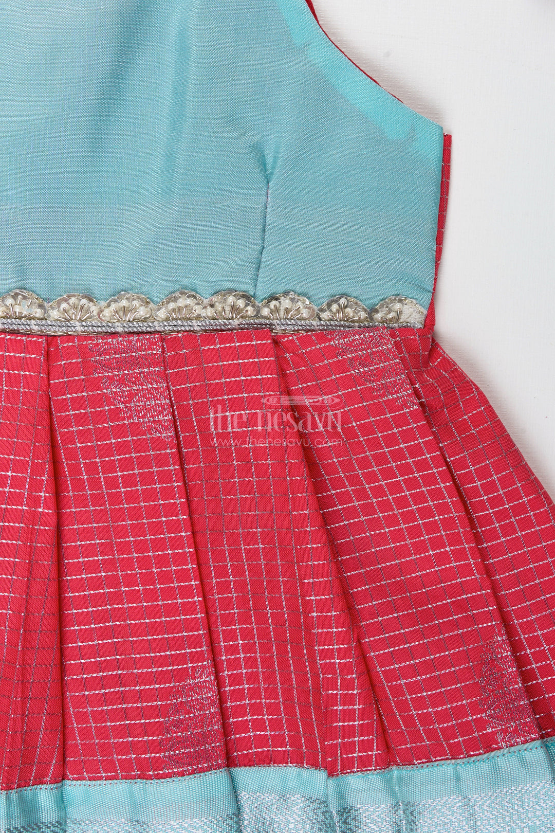 The Nesavu Tie-up Frock Teal and Red Ethnic Frock for Baby Girls Festive Semi Silk Dress with Zari Detailing Nesavu Nesavu Teal And Red Semi Silk Frock For Baby Girls Festive Ethnic Dress With Silver Zari