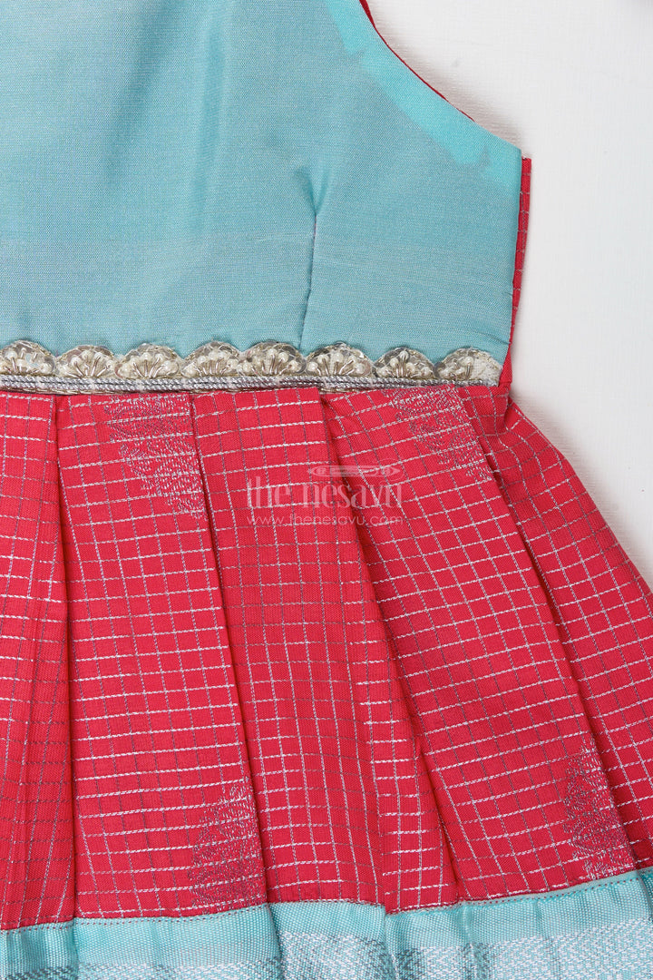 The Nesavu Tie-up Frock Teal and Red Ethnic Frock for Baby Girls Festive Semi Silk Dress with Zari Detailing Nesavu Nesavu Teal And Red Semi Silk Frock For Baby Girls Festive Ethnic Dress With Silver Zari