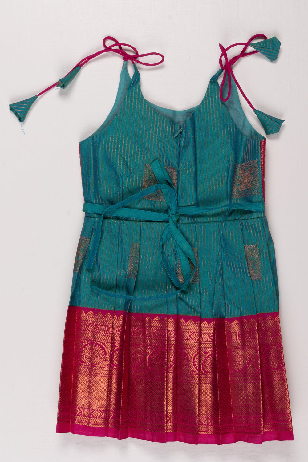 The Nesavu Tie Up Frock Teal Blue and Magenta Silk Frock with Zari Weave and Tie-Up Details Nesavu Teal and Magenta Silk Frock for Girls with Zari Detail | Festive and Playful | The Nesavu