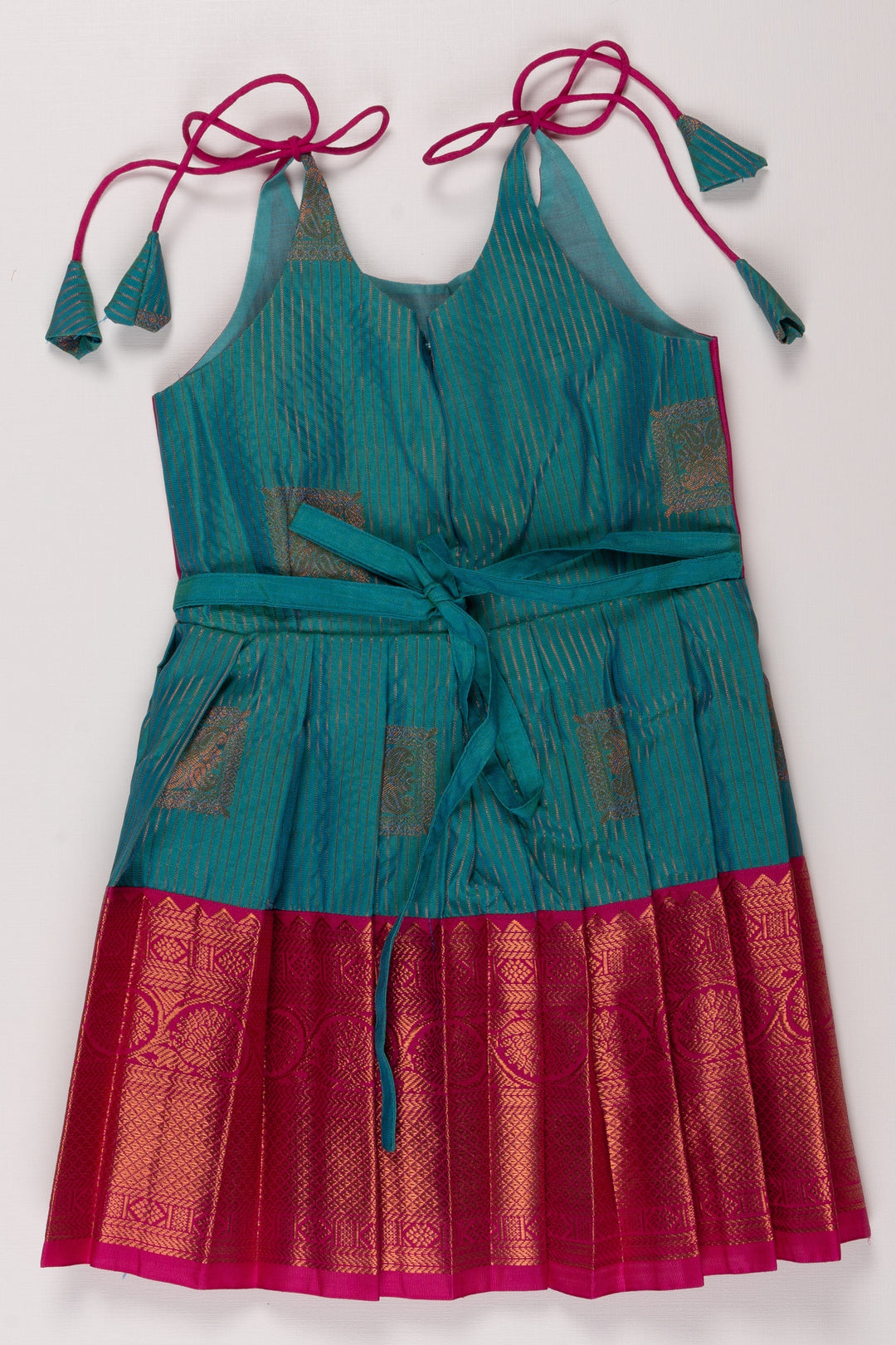 The Nesavu Tie Up Frock Teal Blue and Magenta Silk Frock with Zari Weave and Tie-Up Details Nesavu Teal and Magenta Silk Frock for Girls with Zari Detail | Festive and Playful | The Nesavu