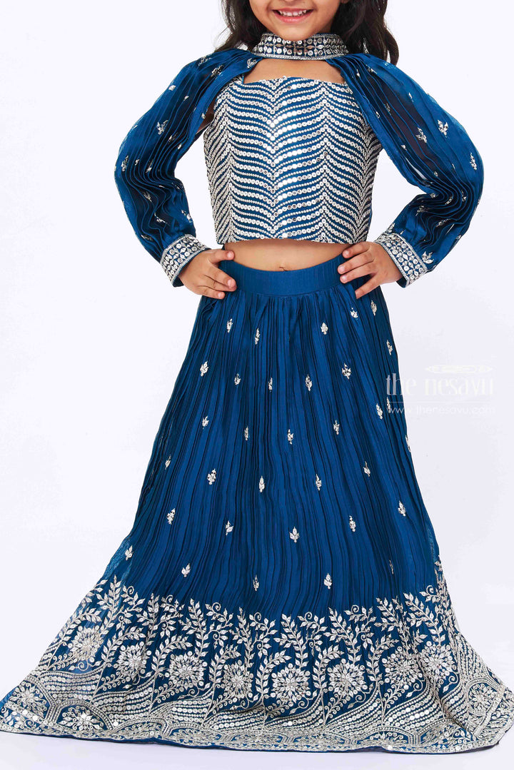 The Nesavu Girls Lehenga Choli Teal Blue Sequin Embroidered Lehenga Set with Crop Top, Detachable Sleeves, and Dupatta for Girls Nesavu Girls Teal Blue Embroidered Lehenga Crop Top | Traditional Wear with Modern Twist