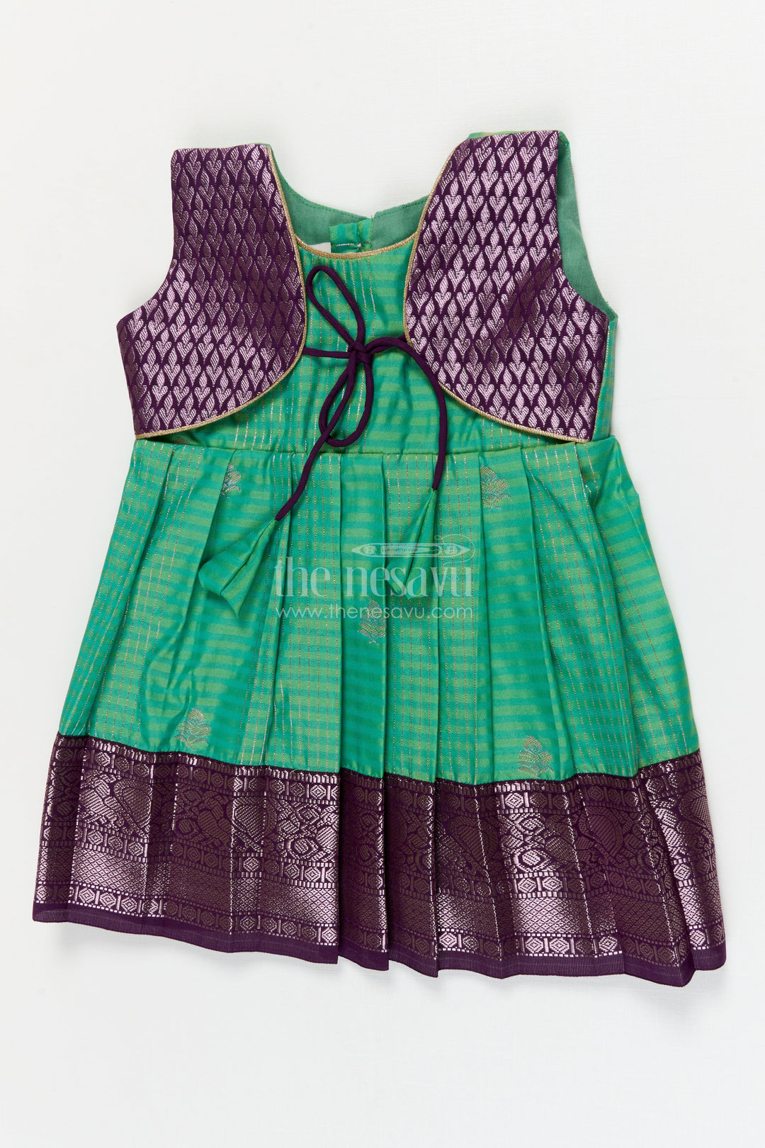 The Nesavu Girls Kanchi Silk Frock Temple Wear Silk Frock for Toddler Girls with Kanchivaram Saree Inspired Zari Border Nesavu 10 (NB) / Green / style 1 KSF015BA-10 Nesavu toddler girl temple wear silk frock with Kanchivaram style zari borders and contrast jacquard yoke