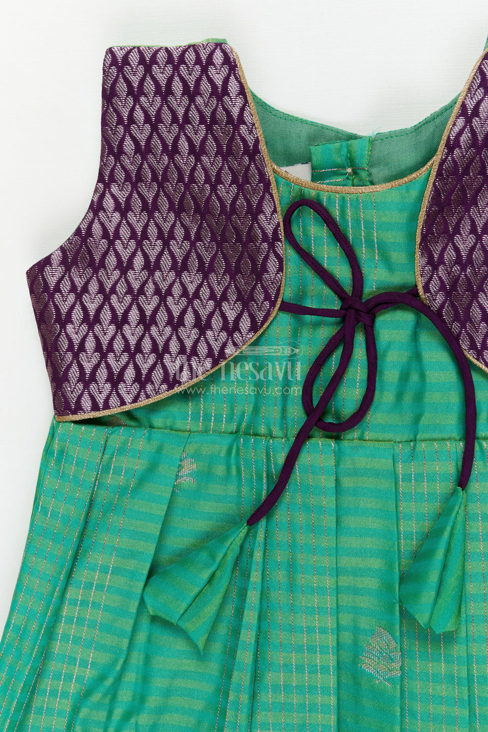 The Nesavu Girls Kanchi Silk Frock Temple Wear Silk Frock for Toddler Girls with Kanchivaram Saree Inspired Zari Border Nesavu Nesavu toddler girl temple wear silk frock with Kanchivaram style zari borders and contrast jacquard yoke