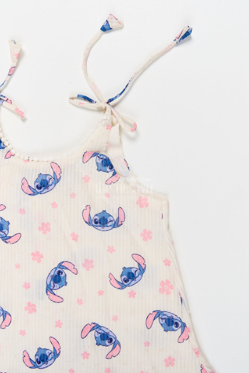 The Nesavu Tie-up Frock Tie-up Shoulder Frock for Toddler Girls with Playful Cartoon Print Nesavu 18 (2Y) / Half white / Georgette T423A-18 Nesavu georgette tie-up frock for toddler girls with cartoon print and flared fit