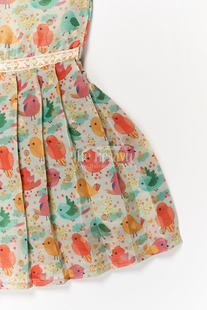 The Nesavu Tie-up Frock Toddler Girl Art Silk Frock for Everyday Wear and Outings Nesavu Nesavu toddler girl everyday frock with digital print and tie-up sleeves in art silk