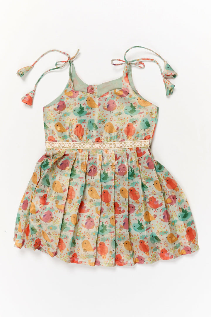 The Nesavu Tie-up Frock Toddler Girl Art Silk Frock for Everyday Wear and Outings Nesavu Nesavu toddler girl everyday frock with digital print and tie-up sleeves in art silk