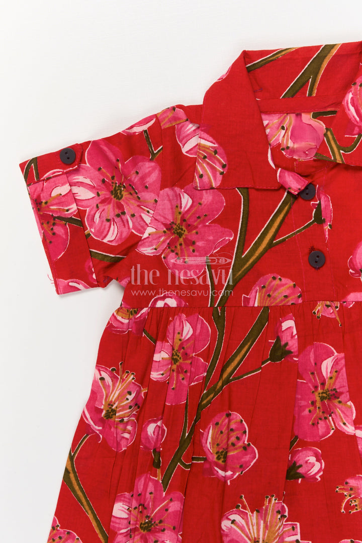 The Nesavu Girls Cotton Frock Toddler Girl Cotton Frock for Casual Functions and Birthdays Nesavu Nesavu toddler girl red cotton frock with pink floral print – ideal for birthdays and casual occasions