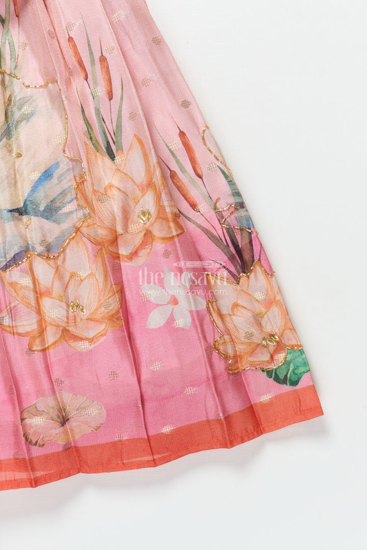 The Nesavu Pattu Pavadai Toddler Girl Pattu Pavadai with Floral Skirt and Semi Banaras Yoke Nesavu Nesavu toddler girl pink floral pattu pavadai with semi Banaras blouse for traditional occasions
