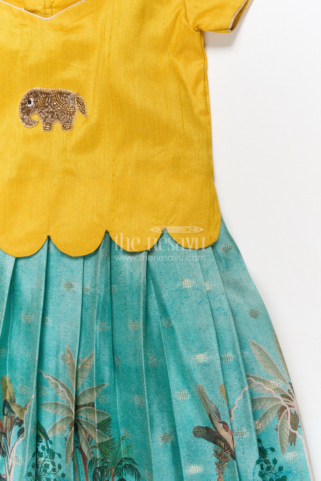 The Nesavu Pattu Pavadai Toddler Girl Pattu Pavadai with Raw Silk Yoke and Art Silk Skirt for Celebration Nesavu Nesavu toddler girl pattu pavadai with raw silk yoke and semi Banaras art silk skirt for family functions