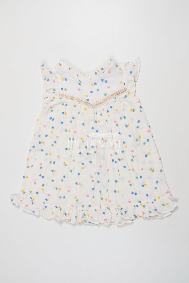 The Nesavu Girls Cotton Frock Toddler Girl Printed Muslin Cotton Frock for Summer and Everyday Comfort Nesavu 18 (2Y) / Half white GFC2034A-18 Nesavu toddler girl muslin cotton frock with heart prints for daily wear and comfort