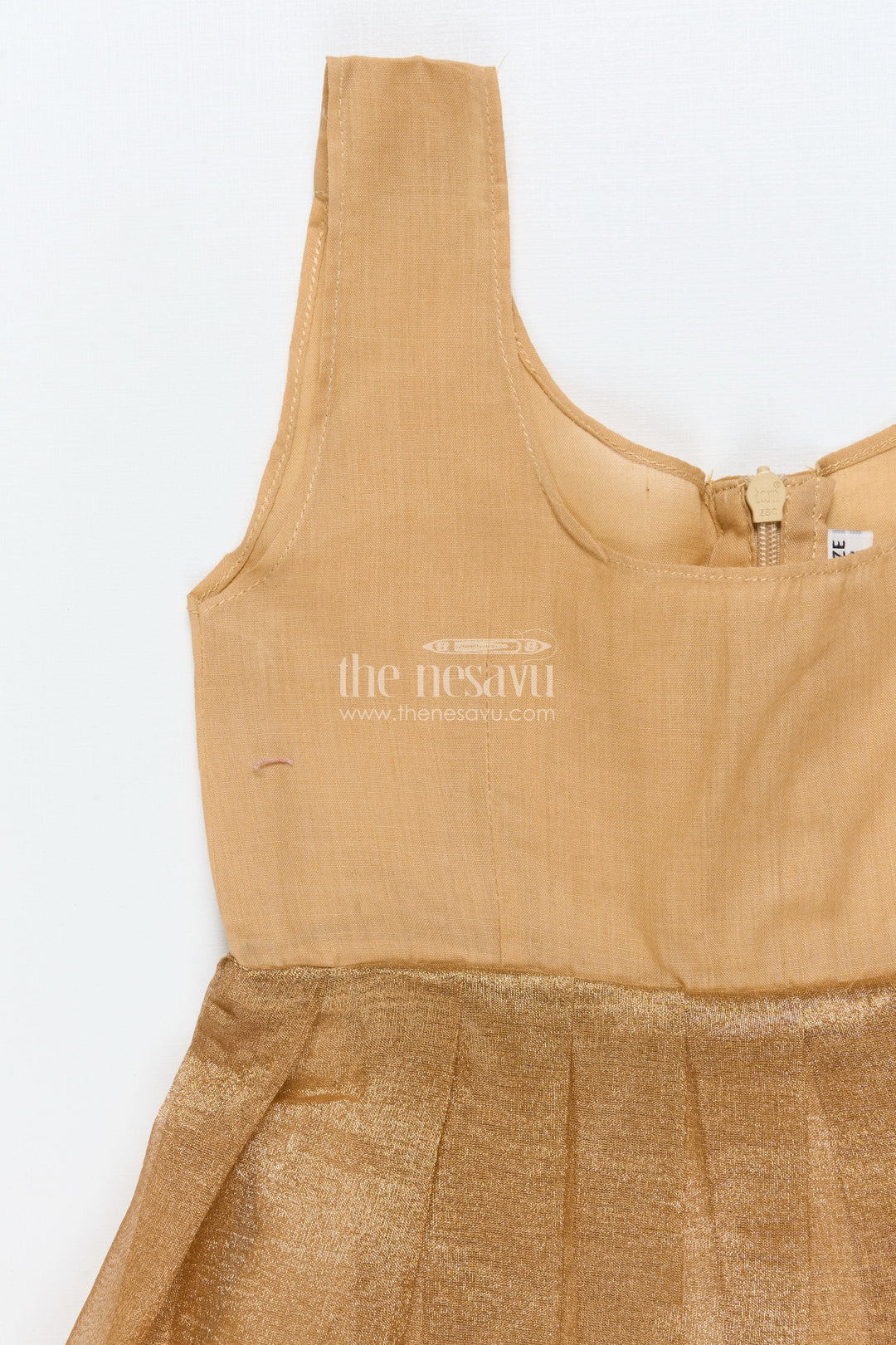 The Nesavu Pattu Pavadai Toddler Girl Tissue Silk Pattu Pavadai with Brocade Blouse and Golden Skirt Nesavu Nesavu toddler girl tissue silk pattu pavadai with brocade blouse for weddings and celebrations