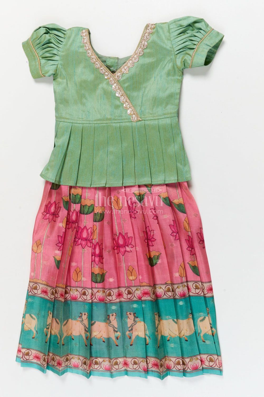 The Nesavu Pattu Pavadai Traditional Baby Pattu Pavadai with Cow and Lotus Print for Ethnic Functions Nesavu 18 (2Y) / Turquoise / Banarasi GPP365A-18 Nesavu baby girl pattu pavadai with cow border and lotus skirt for traditional pooja wear