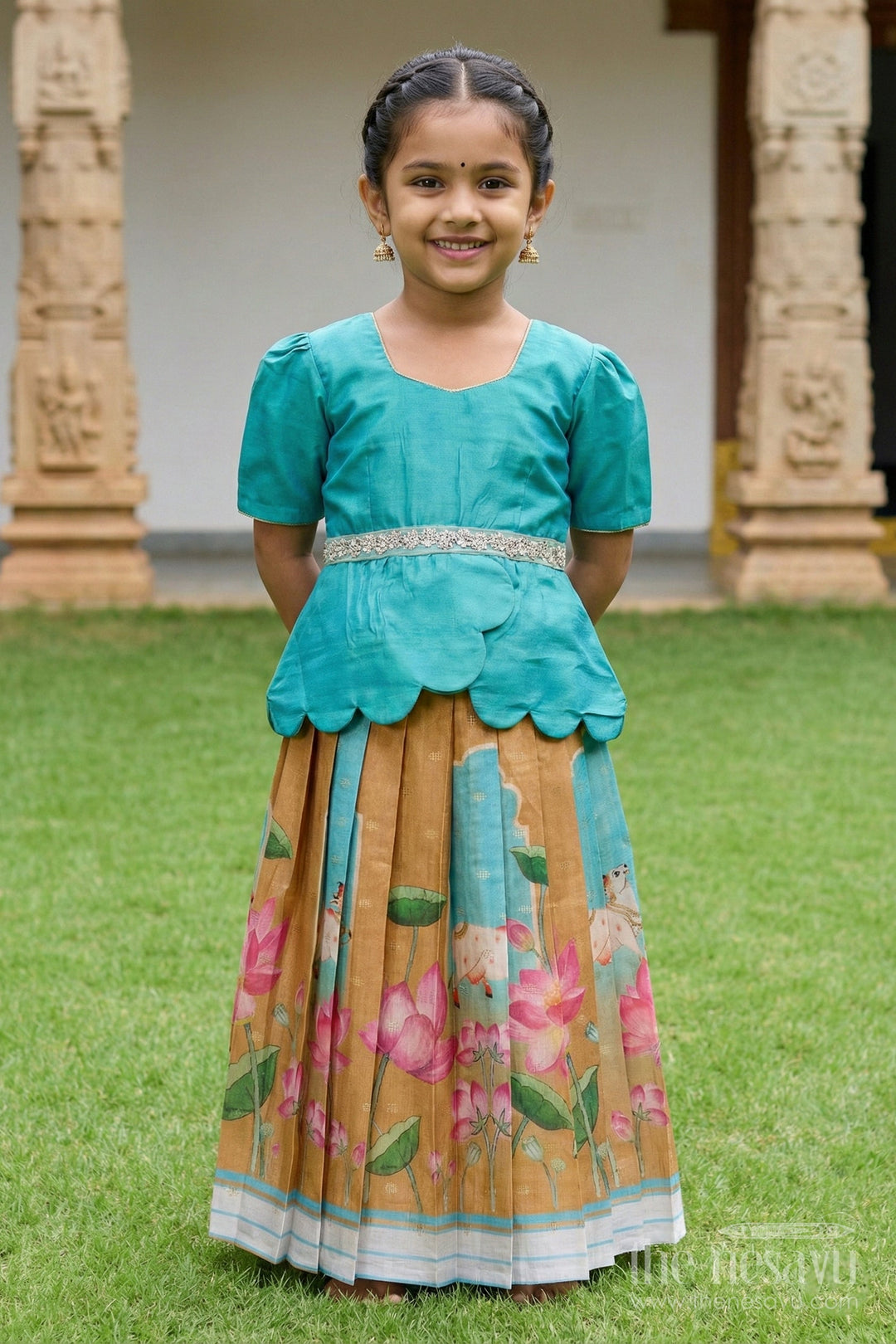 The Nesavu Pattu Pavadai Traditional Baby Pattu Pavadai with Lotus Print Skirt for Festive Photoshoots Nesavu Nesavu baby pattu pavadai with lotus print skirt and scallop blouse for festive occasions