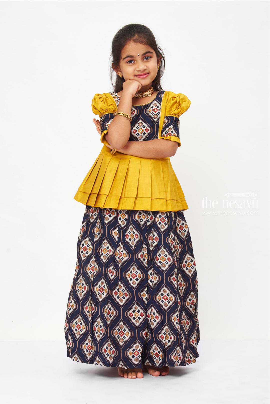 The Nesavu Pattu Pavadai Traditional Folklore-Inspired Mustard Peplum Blouse with Authentic Pattu Pavadai Nesavu Mustard Yellow Traditional Dress - Cultural Folk Pattern Peplum Skirt | The Nesavu