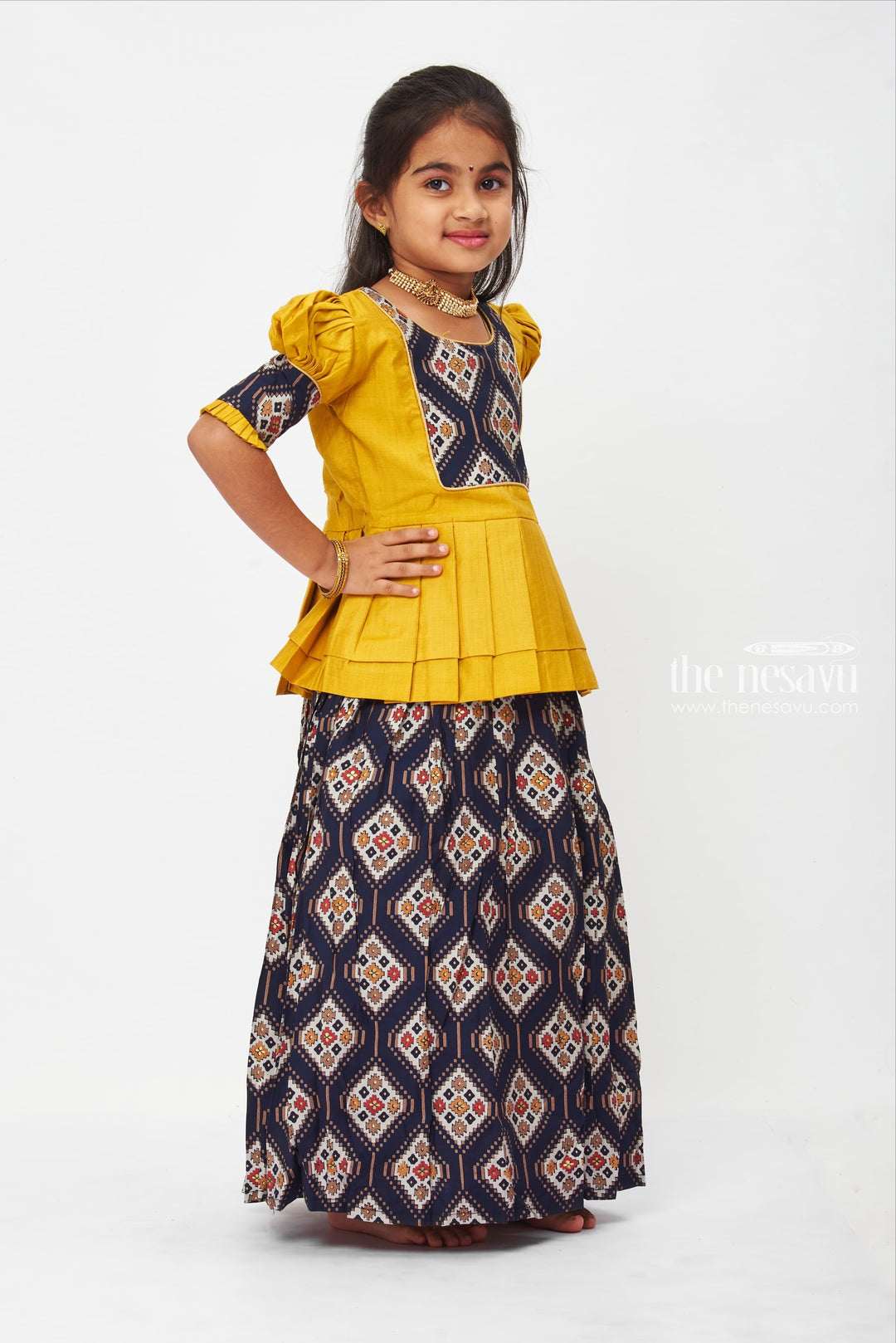 The Nesavu Pattu Pavadai Traditional Folklore-Inspired Mustard Peplum Blouse with Authentic Pattu Pavadai Nesavu Mustard Yellow Traditional Dress - Cultural Folk Pattern Peplum Skirt | The Nesavu