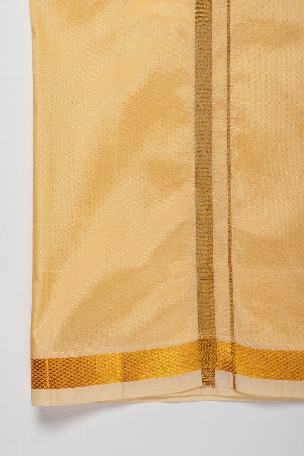 The Nesavu Boys Vesti Traditional Golden Silk Dhoti for Boys with Elegant Border Detailing Nesavu Elegant Golden Silk Dhoti for Boys | Traditional Wear Online | The Nesavu