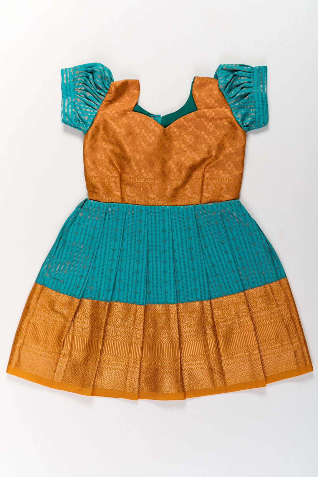 The Nesavu Girls Kanchi Silk Frock Traditional Green and Gold Pattu Pavadai for Girls with Intricate Zari Borders Nesavu Nesavu Traditional Green Gold Pattu Pavadai Girls Zari Borders