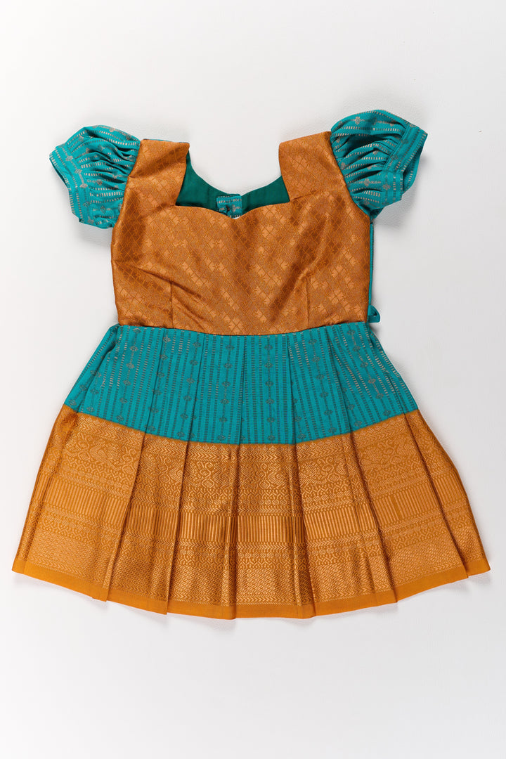 The Nesavu Girls Kanchi Silk Frock Traditional Green and Gold Pattu Pavadai for Girls with Intricate Zari Borders Nesavu Nesavu Traditional Green Gold Pattu Pavadai Girls Zari Borders