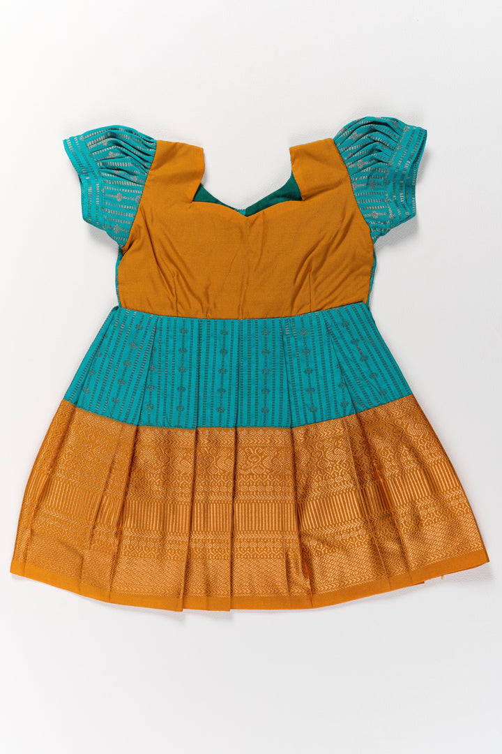 The Nesavu Girls Kanchi Silk Frock Traditional Green and Gold Pattu Pavadai for Girls with Intricate Zari Borders Nesavu Nesavu Traditional Green Gold Pattu Pavadai Girls Zari Borders