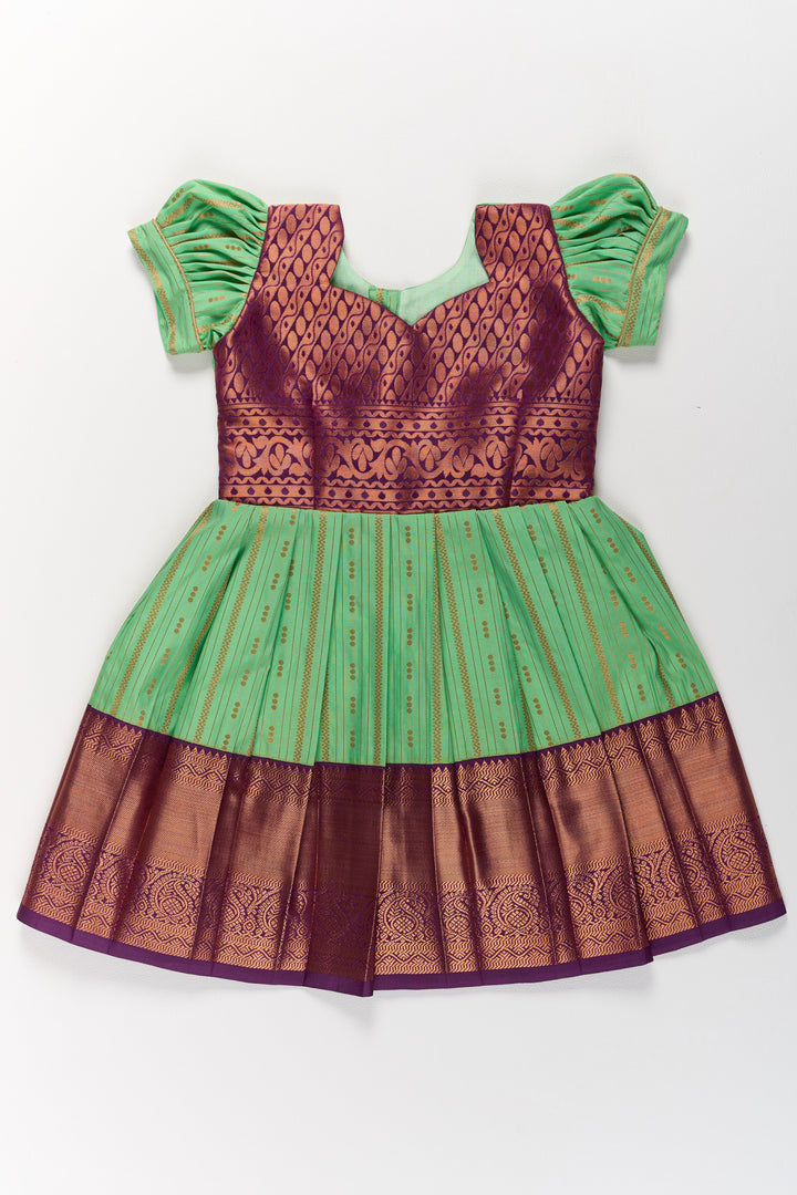 The Nesavu Girls Kanchi Silk Frock Traditional Green and Maroon Pattu Pavadai for Girls with Golden Zari Borders Nesavu Nesavu Traditional Green Maroon Pattu Pavadai Girls Golden Zari Borders