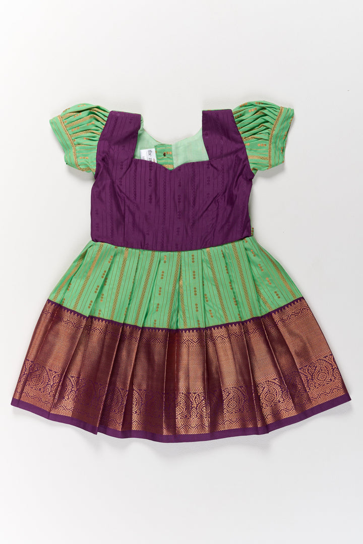 The Nesavu Girls Kanchi Silk Frock Traditional Green and Maroon Pattu Pavadai for Girls with Golden Zari Borders Nesavu Nesavu Traditional Green Maroon Pattu Pavadai Girls Golden Zari Borders
