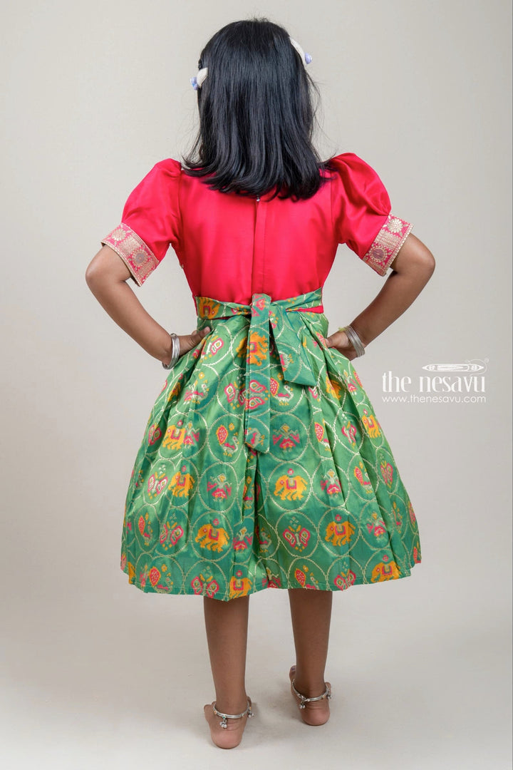 The Nesavu Silk Party Frock Traditional Red And Green Elephant Designer Semi-Silk Frock For Girls Nesavu Latest Silk Gown For Girls | Premium Silk Frock | The Nesavu