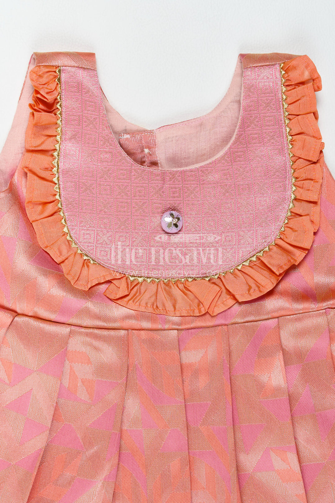 The Nesavu Girls Kanchi Silk Frock Traditional Silk Frock in Peach for Festive Gatherings Nesavu Nesavu Traditional Silk Frock In Peach For Festive Gatherings