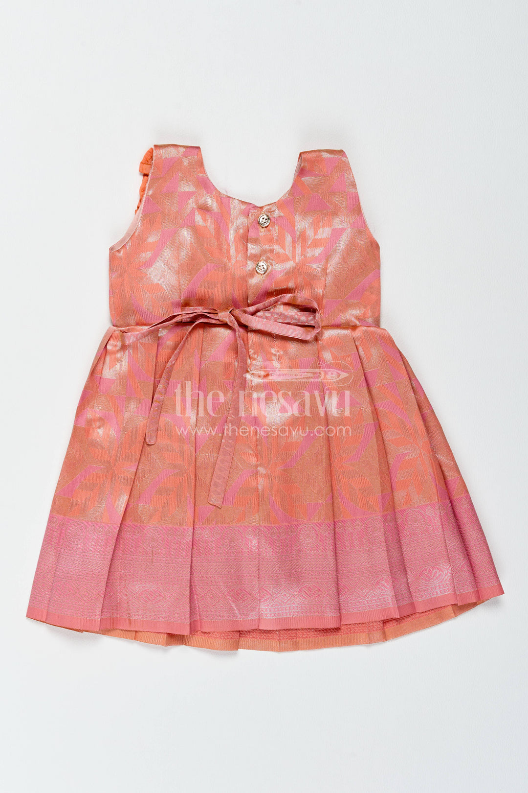 The Nesavu Girls Kanchi Silk Frock Traditional Silk Frock in Peach for Festive Gatherings Nesavu Nesavu Traditional Silk Frock In Peach For Festive Gatherings