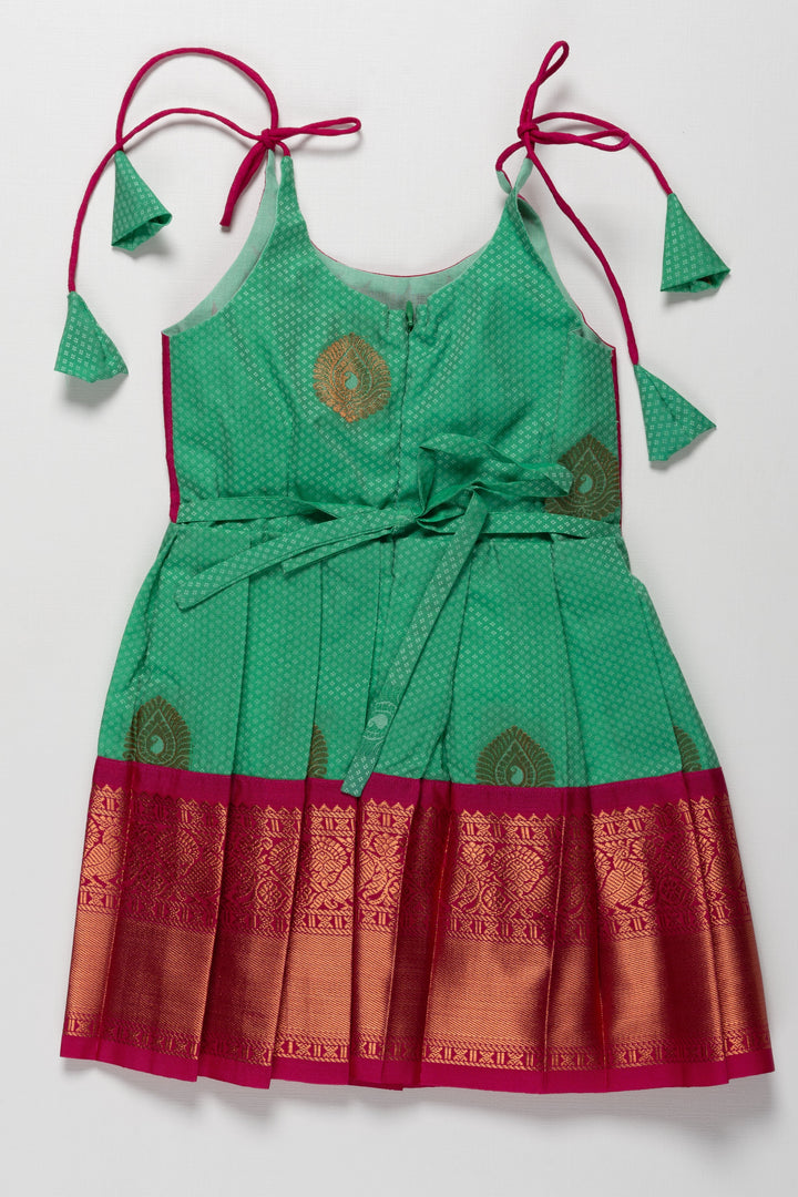 The Nesavu Tie-up Frock Traditional Silk Tie-Up Frock for Irubathiyettam and Namakaranam - Green and Maroon Nesavu Traditional Silk TieUp Frock for Girls Green and Maroon | Festive Wear | The Nesavu