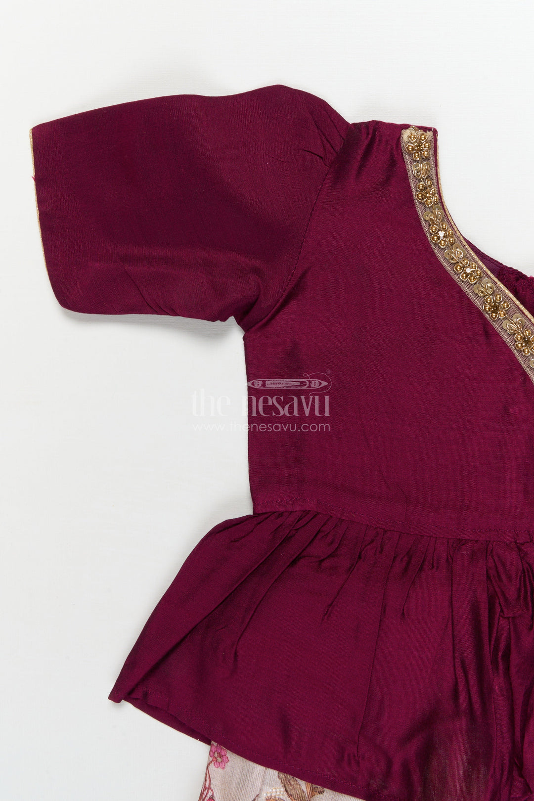 The Nesavu Pattu Pavadai Traditional Wrap-style Baby Pattu Pavadai for Festive Milestones Nesavu Nesavu wrap-style baby pattu pavadai with jungle print skirt for traditional festivities