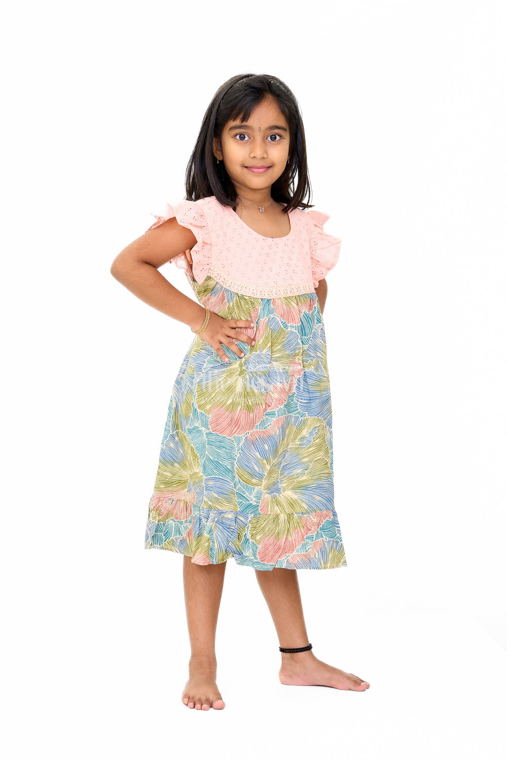 The Nesavu Girls Cotton Frock Trendy Girls Cotton New Dress with Vibrant Leaf Print and Lace Yoke Nesavu Nesavu Girls Cotton New Dress Bold Leaf Print Flutter Sleeves Lace Detailing