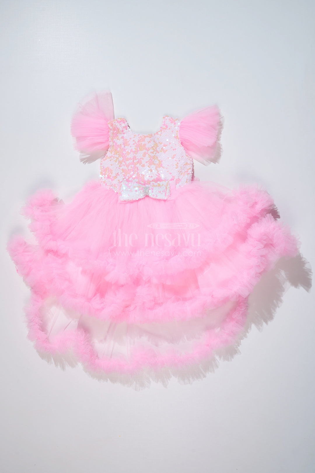 The Nesavu Girls Fancy Party Frock Trendy Pink Western Party Dress for Girls with Sequin Bow and High-Low Hem Nesavu 16 (1Y) / Pink PF197A-16 Nesavu Stylish Pink Western Party Dress Girls Sequin Bow High-Low Hem