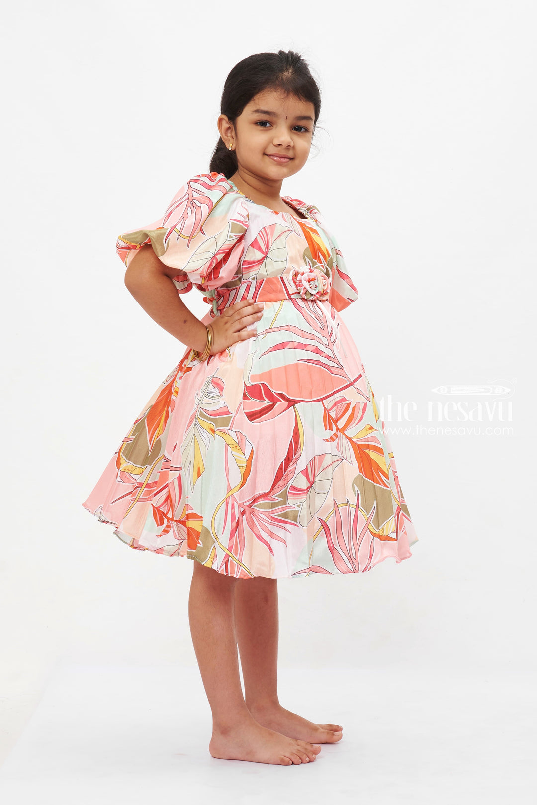 The Nesavu Girls Fancy Frock Tropical Sunset Puff Sleeve Dress: Girls' Colorful Botanical Print Frock with Rose Detail Nesavu Girls Botanical Print Puff Sleeve Dress | Vibrant Tropical Wear | Elegant Rose Detail Frock | The Nesavu