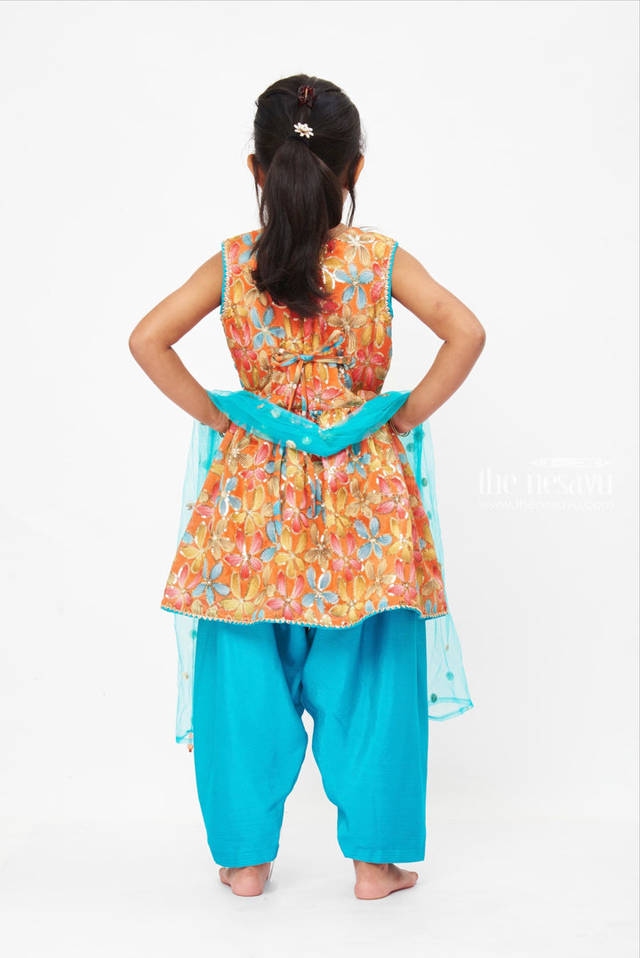 The Nesavu Girls Sharara / Plazo Set Vibrant Floral Peplum Top with Teal Dhoti Pant Set for Girls Nesavu Girls Vibrant Floral Peplum Top with Teal Dhoti Pants | Colorful Ethnic Set | The Nesavu