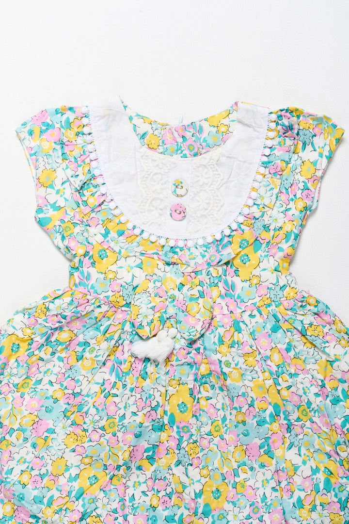 The Nesavu Girls Cotton Frock Vibrant Girls Cotton Frock with Multicolor Floral Print and Lace Hem – Frock for Reception Nesavu Nesavu Girls Cotton Frock Multicolor Floral Print Lace Trim  Ideal Frock Reception