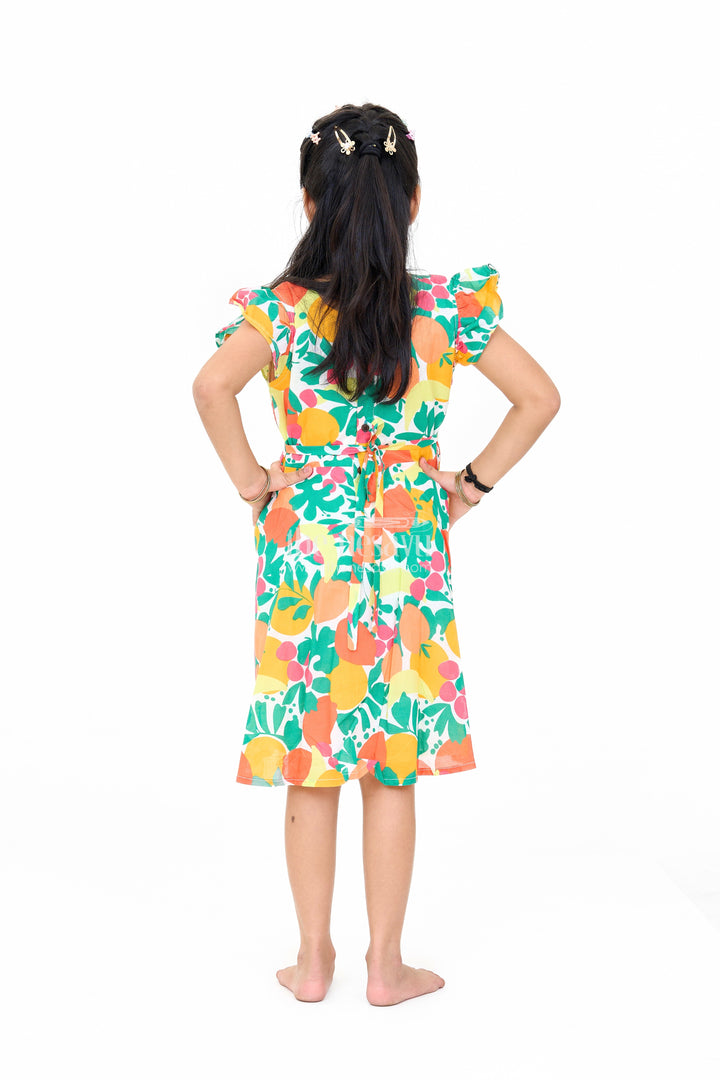 The Nesavu Girls Cotton Frock Vibrant Girls Cotton Ki Gown with Bold Fruit Print and Flutter Sleeves Nesavu Nesavu Girls Cotton Ki Gown Bright Fruit Print A-Line Design Flutter Sleeves